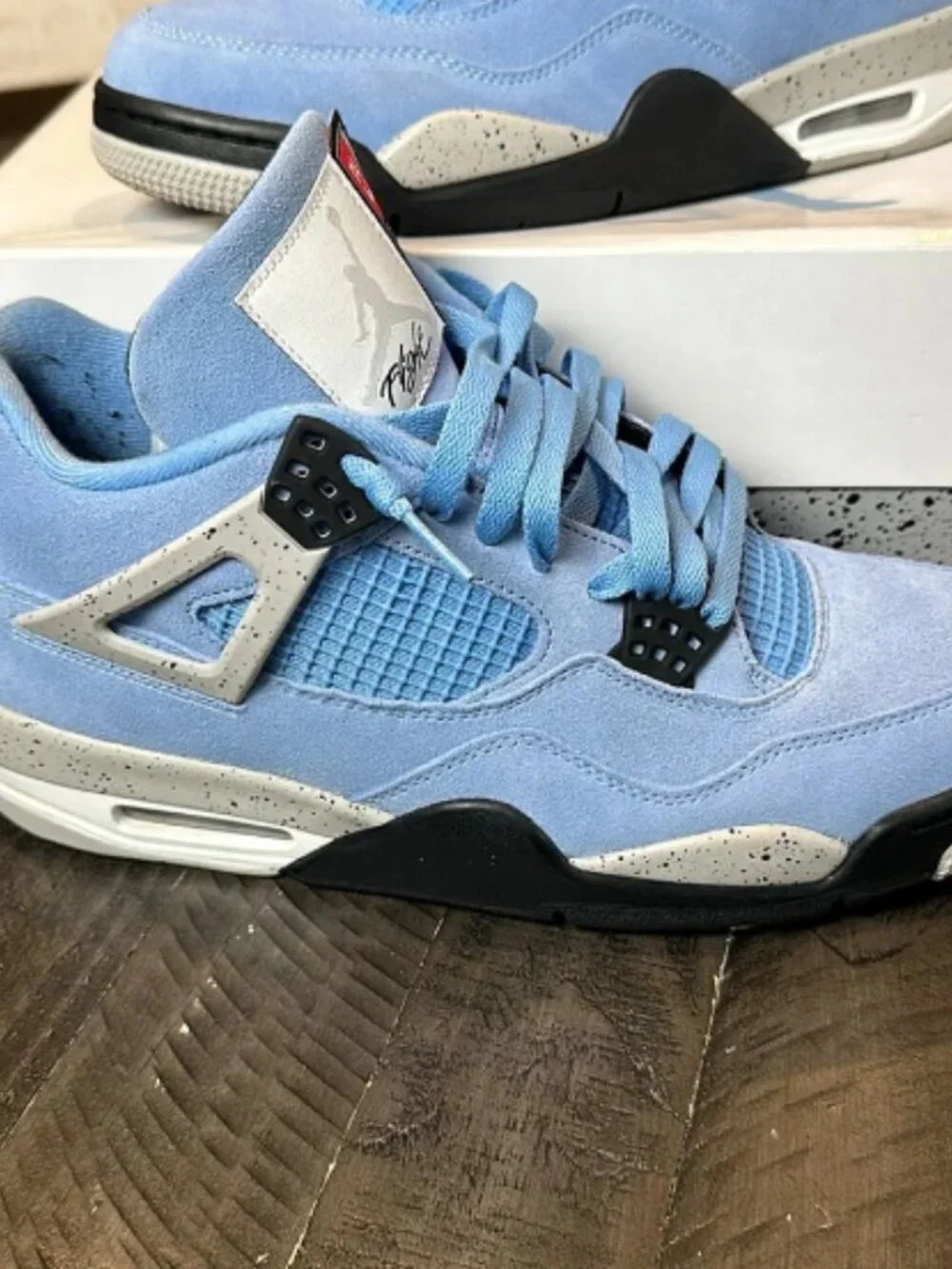 Jordan 4 Retro University Blue Sneakers